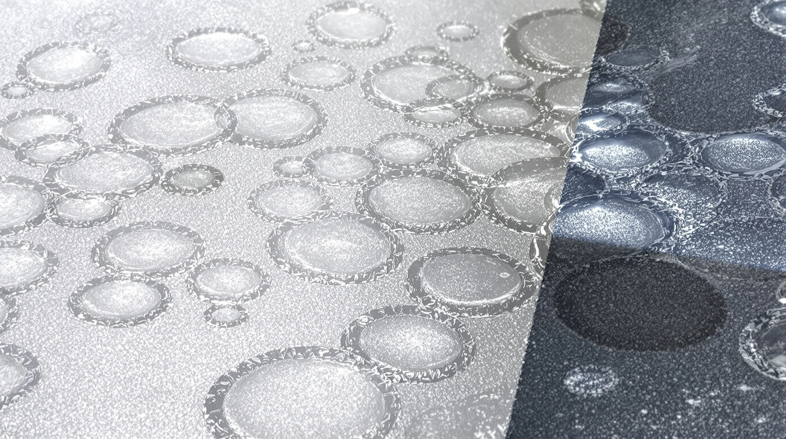 Multiple raised blisters on a commercial flat roof membrane caused by trapped air or moisture beneath the surface